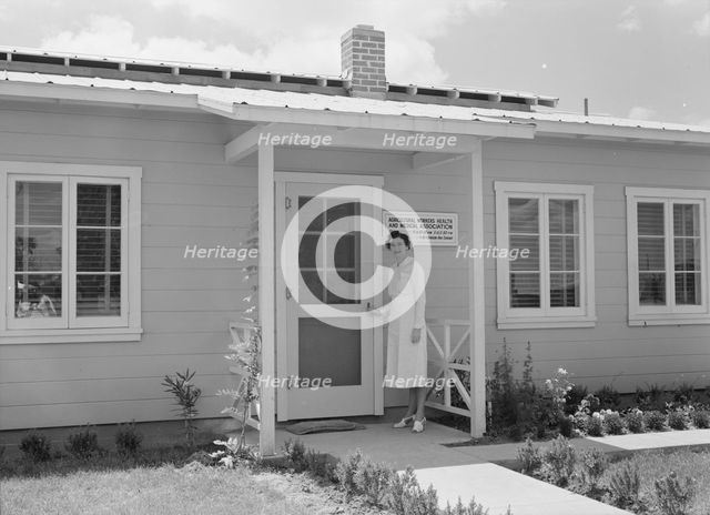 Resident nurse and clinic, FSA camp, Farmersville, Tulare County, California, 1939. Creator: Dorothea Lange.