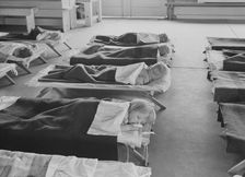 Rest time in nursery school for migrant children at Shafter Camp, California, 1939. Creator: Dorothea Lange
