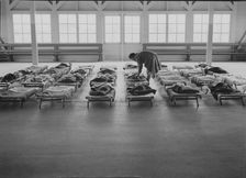 Rest time in nursery school for migrant children at Shafter Camp, California, 1939. Creator: Dorothea Lange