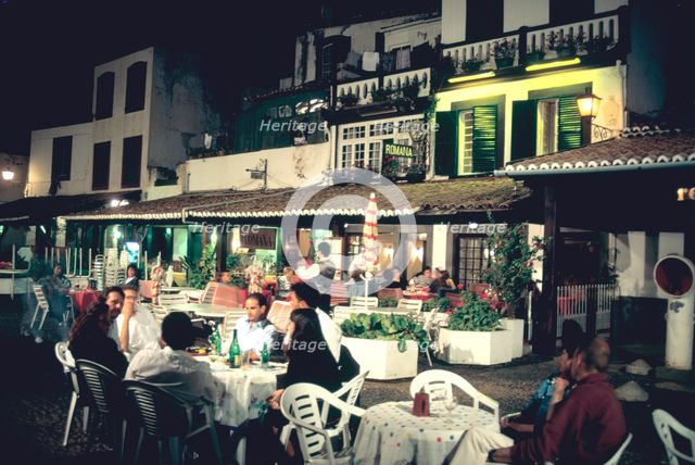 Restaurant in the old town, Funchal, Madeira, Portugal. Creator: Peter Thompson.
