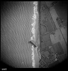 RFA tanker Olcades, beached following a high spring tide and massive gales, Walcot, Norfolk, 1953. Artist: RAF photographer