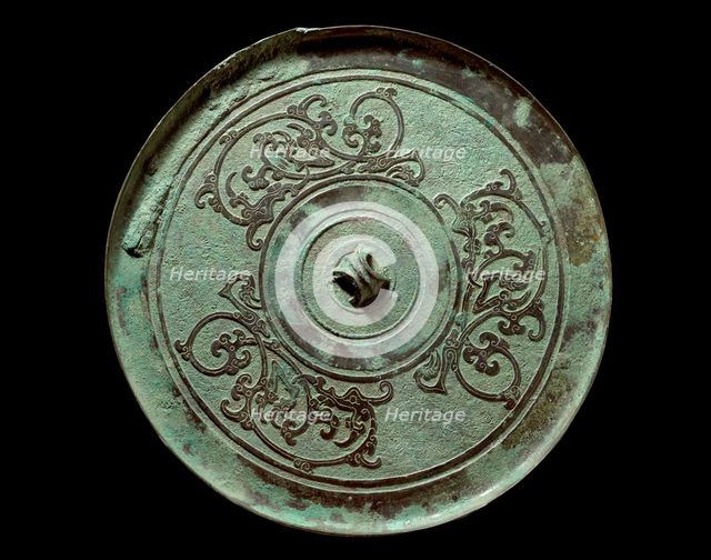 Ritual mirror with interlaced dragons on a geometric ground, 2nd century BC. Artist: Unknown.