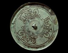 Ritual mirror with interlaced dragons on a geometric ground, 2nd century BC