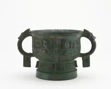Ritual grain server (gui) with masks, Western Zhou dynasty, ca. late 11th-early 10th century BCE. Creator: Unknown
