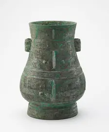 Ritual wine container (hu) with masks and dragons, Late Shang dynasty, ca. 12th century BCE. Creator: Unknown