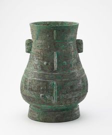 Ritual wine container (hu) with masks and dragons, Late Shang dynasty, ca. 12th century BCE. Creator: Unknown