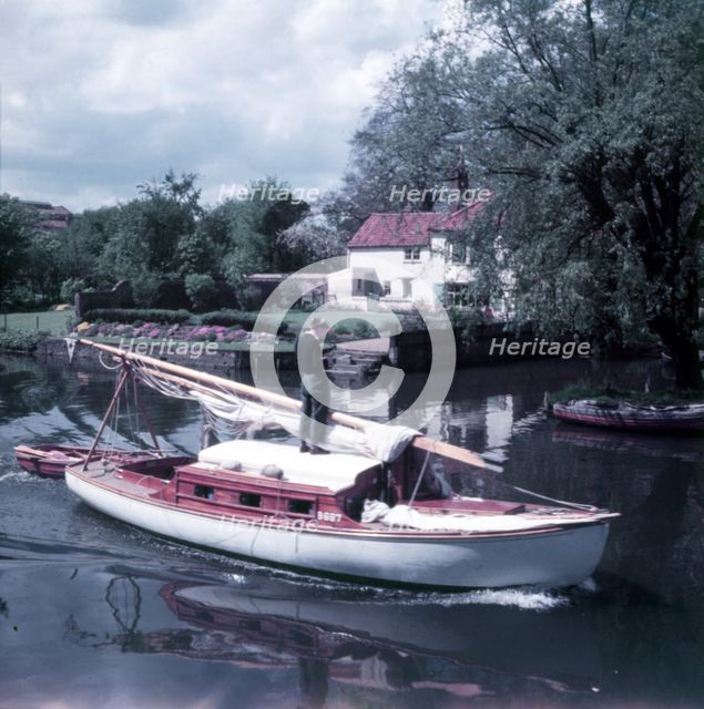 River craft on the Wensum, near Pulls Ferry, Norwich, Norfolk, c1955.  Creator: Arthur Charles Kirby Ware.