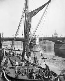 River barge at Southwark Bridge, London. Creator: Unknown