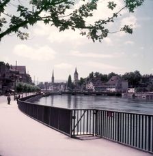 River Limmat, St Peter's and the Fraumünster, Zurich, Switzerland, c1955. Creator: Arthur Charles Kirby Ware
