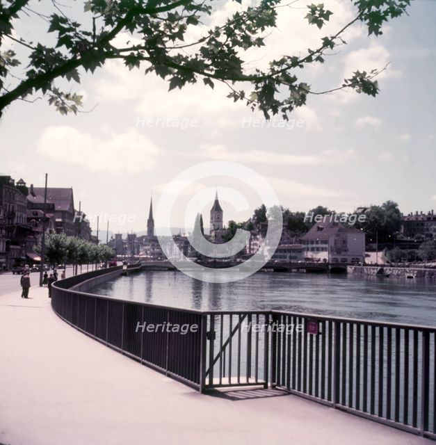 River Limmat, St Peter's and the Fraumünster, Zurich, Switzerland, c1955. Creator: Arthur Charles Kirby Ware.