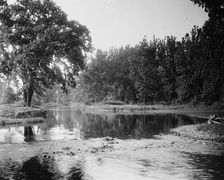 River, probably the Huron River, Ypsilanti, Michigan, between 1900 and 1910. Creator: Unknown