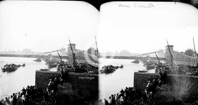 River Thames on University Boat Race day, Hammersmith, London, c1870-1883. Artist: York & Son