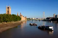 River Thames, Houses of Parliament and The London Eye, London. Creator: Peter Thompson