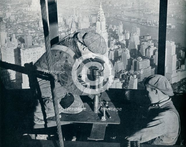'Rivetting the last bolts on The Morning Mast of the Empire State building', c1931. Artist: Lewis Wickes Hine.