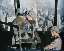 Rivetting the last bolts on "The Morning Mast" of the Empire State building c1931. Creator: Lewis Wickes Hine