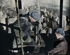 Rivetting the last bolts on The Morning Mast of the Empire State building c1931. Artist: Lewis Wickes Hine