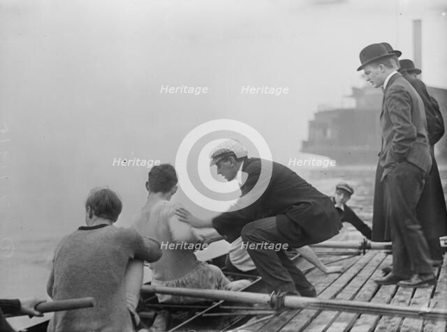 Rice, coach of Columbia Varsity crew team instructing, 1910. Creator: Bain News Service.