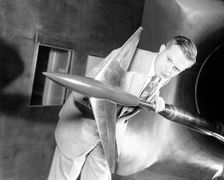 Richard Whitcomb with Area Rule Wind Tunnel Model, USA, April 20, 1955. Creator: Unknown