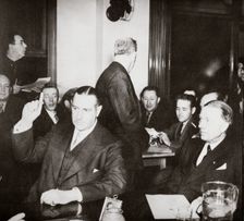 Richard Whitney being sworn in at a public hearing regarding his misappropriation of funds, c1938