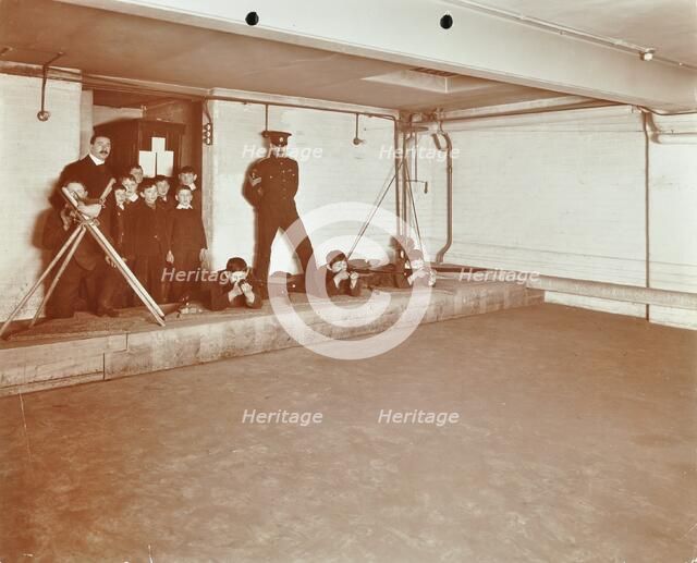 Rifle shooting lesson, Jews' Free School, Stepney, London, 1908. Artist: Unknown.