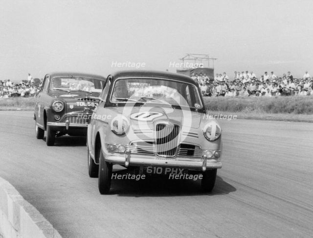 Riley 1.5, Grace leads Jack Sears in Austin Westminster at Silverstone 1958. Creator: Unknown.