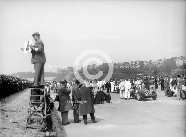 Riley 1985 cc competing in the JCC International Trophy, Brooklands, 2 May 1936. Artist: Bill Brunell.