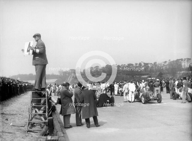Riley 1985 cc competing in the JCC International Trophy, Brooklands, 2 May 1936. Artist: Bill Brunell.