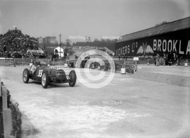 Riley 1985 cc competing in the JCC International Trophy, Brooklands, 2 May 1936. Artist: Bill Brunell.
