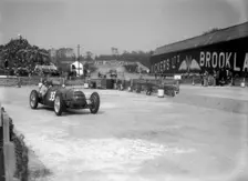 Riley 1985 cc competing in the JCC International Trophy, Brooklands, 2 May 1936. Artist: Bill Brunell