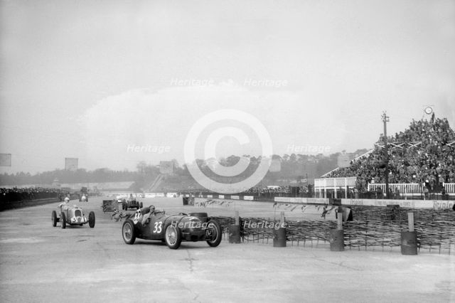 Riley 1985 cc leading MG K3 Magnette, JCC International Trophy, Brooklands, 2 May 1936. Artist: Bill Brunell.