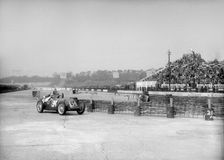 Riley 1985 cc negotiating the chicane at the JCC International Trophy, Brooklands, 2 May 1936. Artist: Bill Brunell