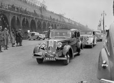 Riley 4-door saloon of AS Bassett at the RAC Rally, Madeira Drive, Brighton, 1939. Artist: Bill Brunell