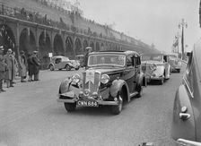 Riley 4-door saloon of AS Bassett at the RAC Rally, Madeira Drive, Brighton, 1939. Artist: Bill Brunell
