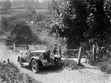 Riley 4-seat tourer taking part in a West Hants Light Car Club Trial, Ibberton Hill, Dorset, 1930s. Artist: Bill Brunell