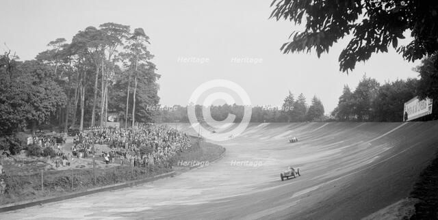 Riley 9 Brooklands on the banking at Brooklands. Artist: Bill Brunell.