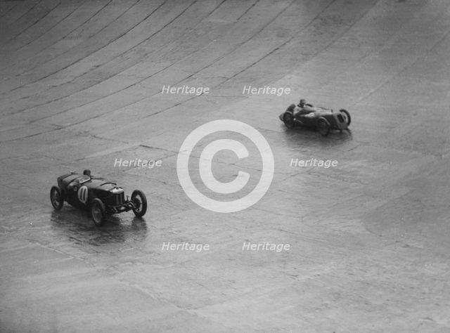 Riley 9 Brooklands and Austin 7 racing at a BARC meeting, Brooklands, Surrey, 1931 Artist: Bill Brunell.
