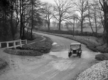 Riley 9 of HC Holm competing in the Ilkley & District Motor Club Trial, Yorkshire, 1930s. Artist: Bill Brunell