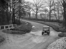 Riley 9 of HC Holm competing in the Ilkley & District Motor Club Trial, Yorkshire, 1930s. Artist: Bill Brunell