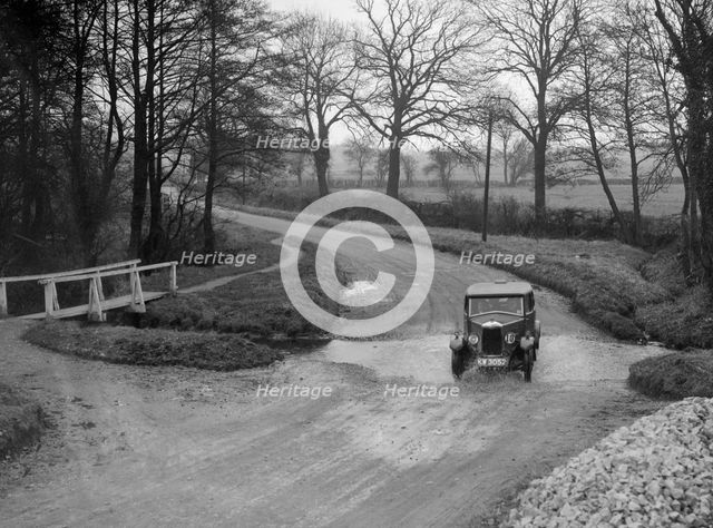 Riley 9 of HC Holm competing in the Ilkley & District Motor Club Trial, Yorkshire, 1930s. Artist: Bill Brunell.