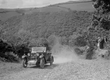Riley 9 open 4-seater tourer at the Mid Surrey AC Barnstaple Trial, Beggars Roost, Devon, 1934. Artist: Bill Brunell