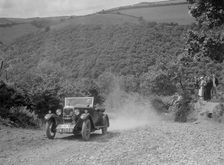 Riley 9 open 4-seater tourer at the Mid Surrey AC Barnstaple Trial, Beggars Roost, Devon, 1934. Artist: Bill Brunell