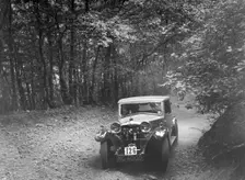 Riley competing in the B&HMC Brighton-Beer Trial, Fingle Bridge Hill, Devon, 1934. Artist: Bill Brunell