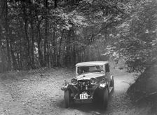 Riley competing in the B&HMC Brighton-Beer Trial, Fingle Bridge Hill, Devon, 1934. Artist: Bill Brunell