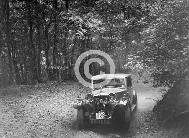 Riley competing in the B&HMC Brighton-Beer Trial, Fingle Bridge Hill, Devon, 1934. Artist: Bill Brunell.