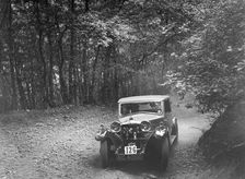 Riley competing in the B&HMC Brighton-Beer Trial, Fingle Bridge Hill, Devon, 1934. Artist: Bill Brunell