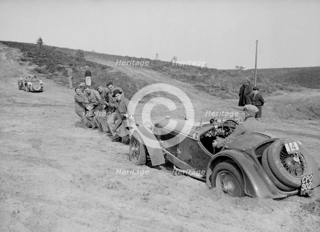 Riley Birdcage Sprite competing in the Great Weat Motor Club Trial, 1938. Artist: Bill Brunell.