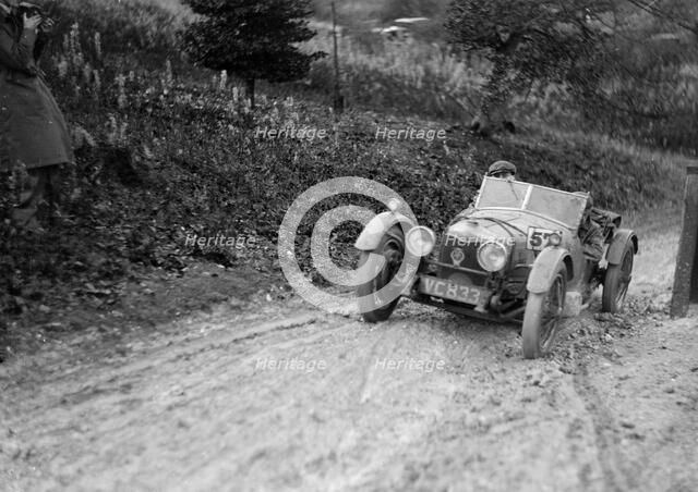 Riley Brooklands 2-seater sports of JE Lancaster taking part in the Inter-Varsity Trial, 1930. Artist: Bill Brunell.