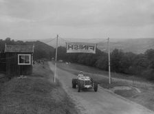 Riley finishing the Shelsley Walsh Hillclimb, Worcestershire, 1935. Artist: Bill Brunell