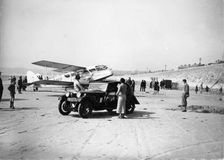 Riley Kestrel and a Dragon aircraft on a beach, 1934