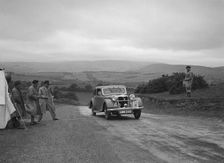Riley Kestrel of A Bassett competing in the South Wales Auto Club Welsh Rally, 1937 Artist: Bill Brunell